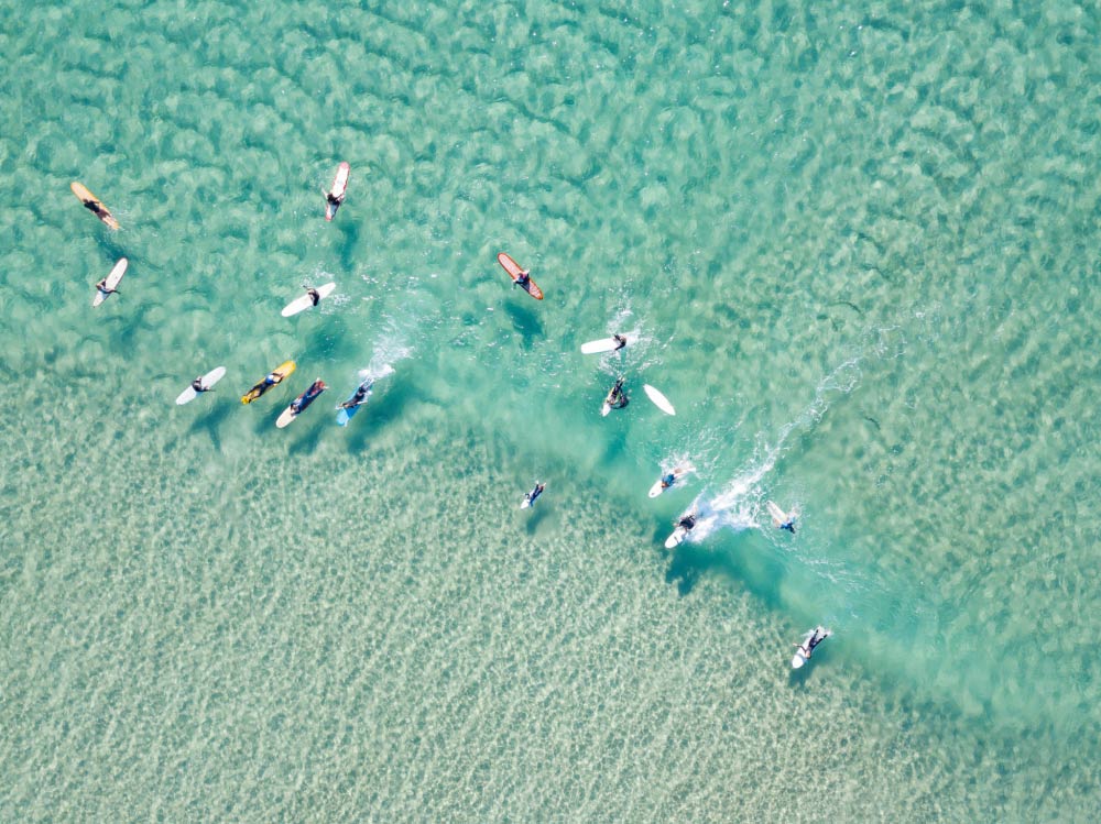 Crystal Clear Waters with Surfers - Vicki Smith Enlarged