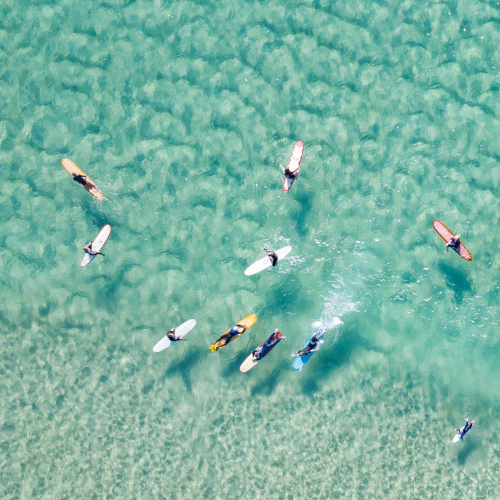 Crystal Clear Waters with Surfers - Vicki Smith Enlarged